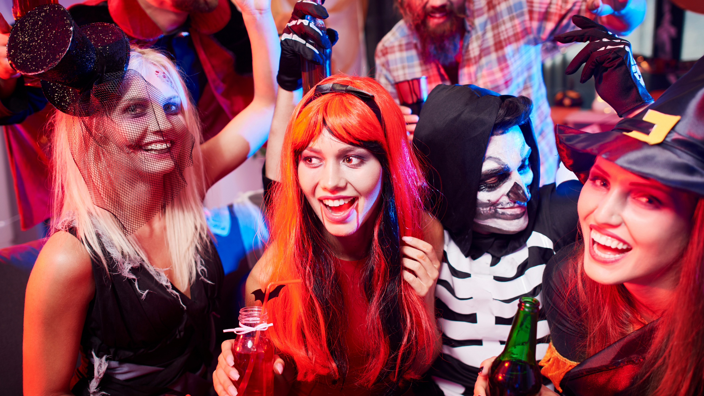 ladies at a party dressed up for halloween