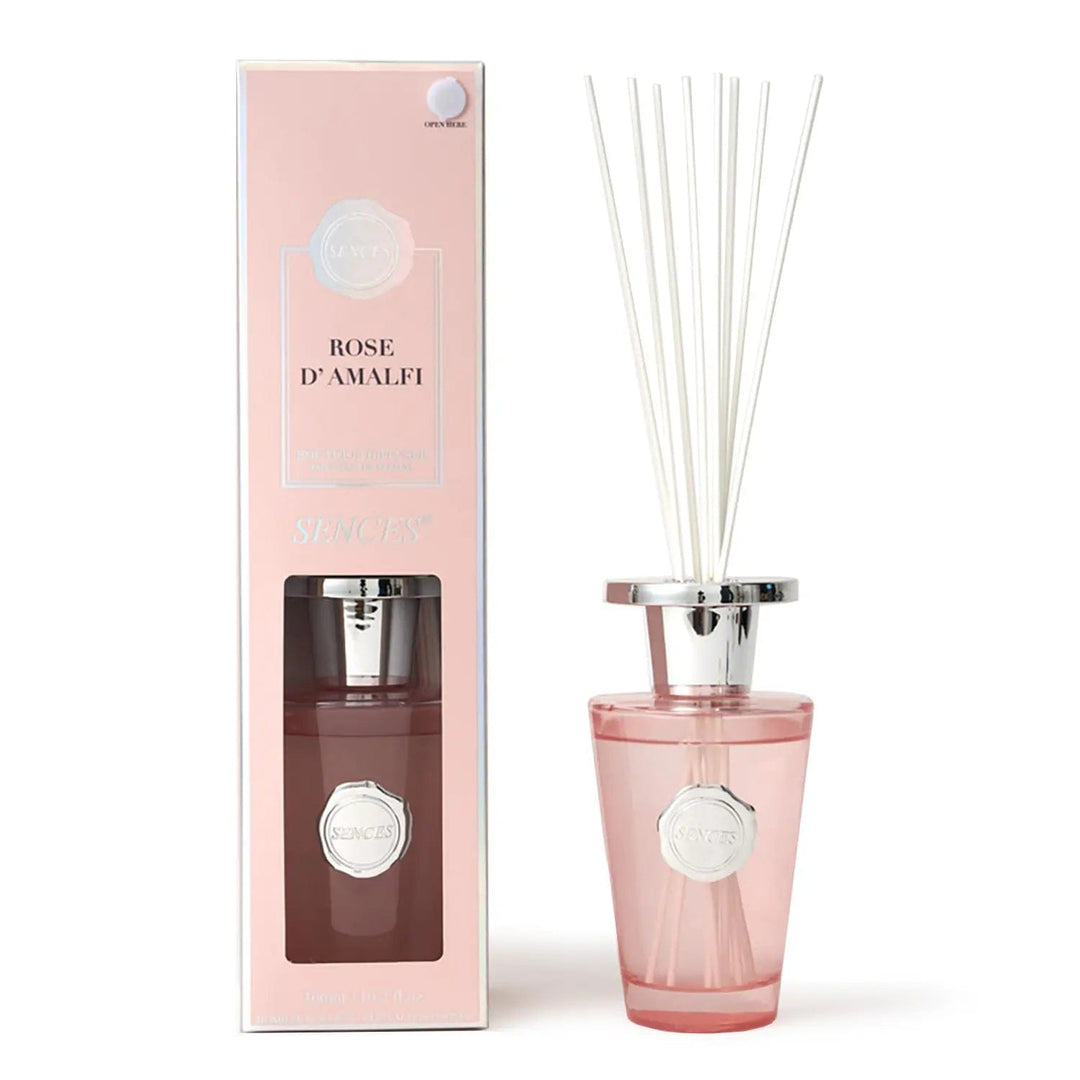 Rose D'Amalfi scented diffuser in pink with silver top bottle and white reeds