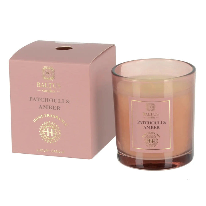 Patchouli & Amber scented candle in a glass jar with pink gift box packaging