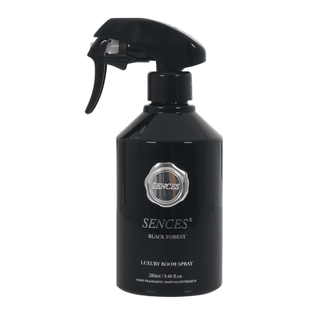 black forest scented room spray in black glass bottle with silver brand and product details