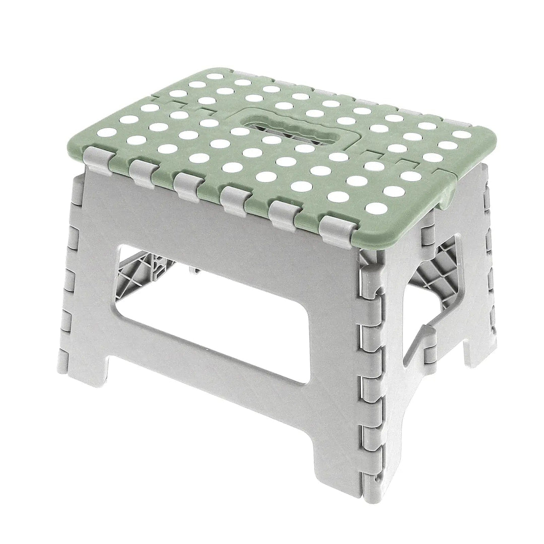 Compact folding stool with white non-slips dots on top