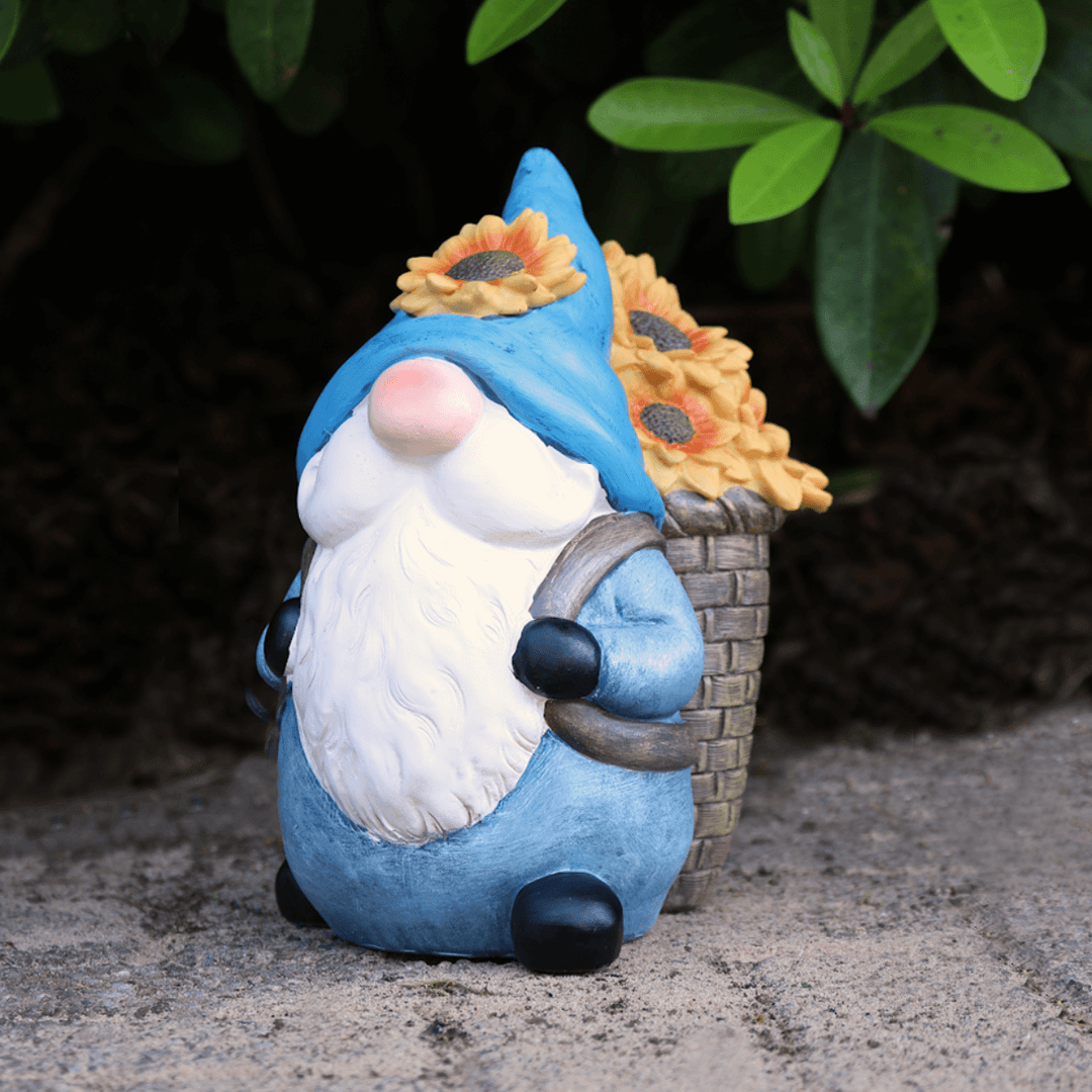 small blue gnome resin ornament on ourdoor patio space