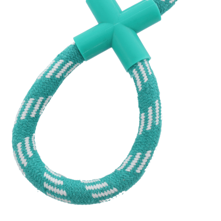 close up of green rope toy with white accents and green plastic centre