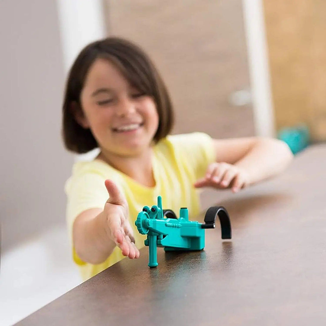 Child playing with Crazy Robot built from a kit