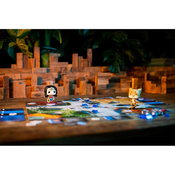 Wonder woman and the cheetah vinyl figures on game board