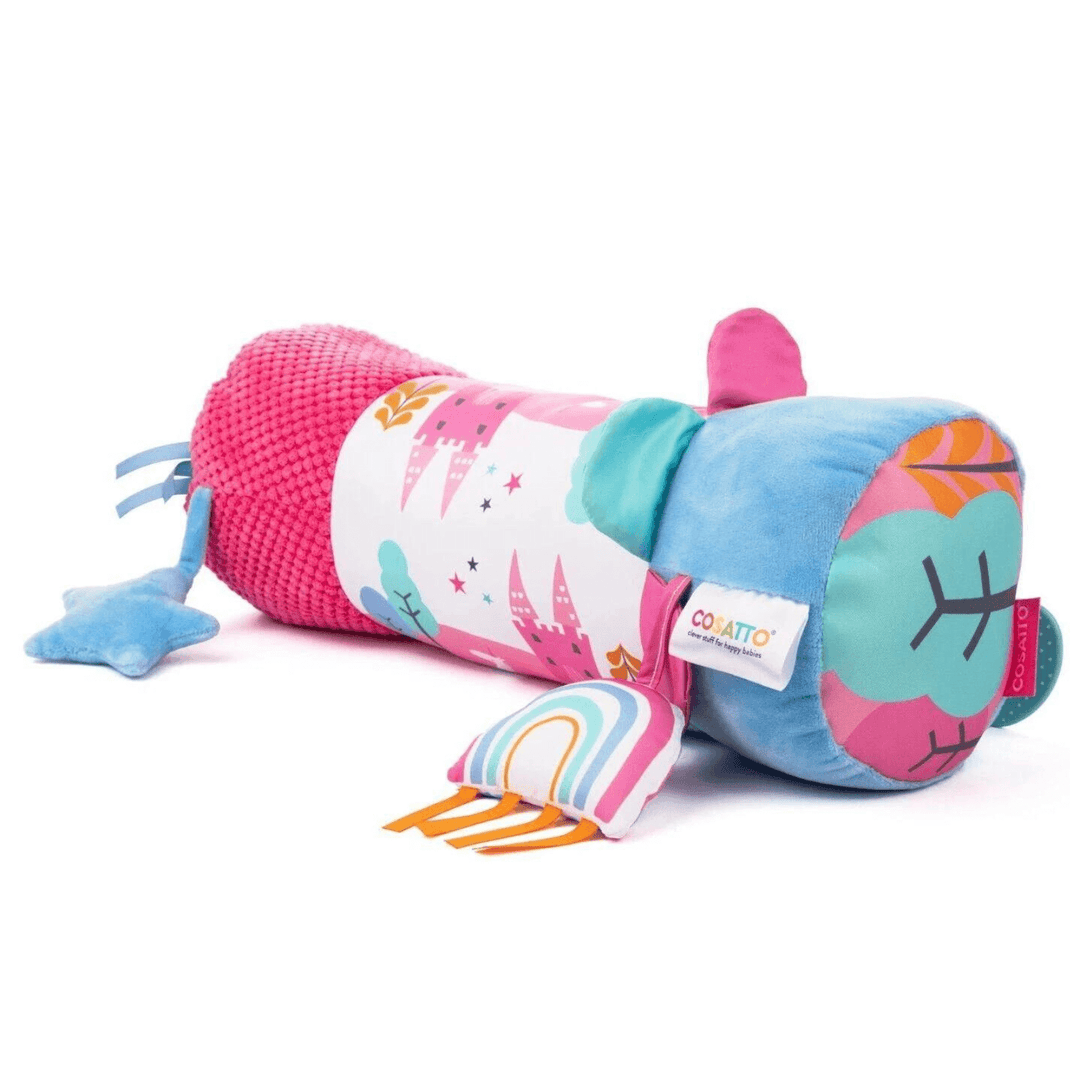 pink unicorn land tummy time roller featuring rainbow and plush star toy.