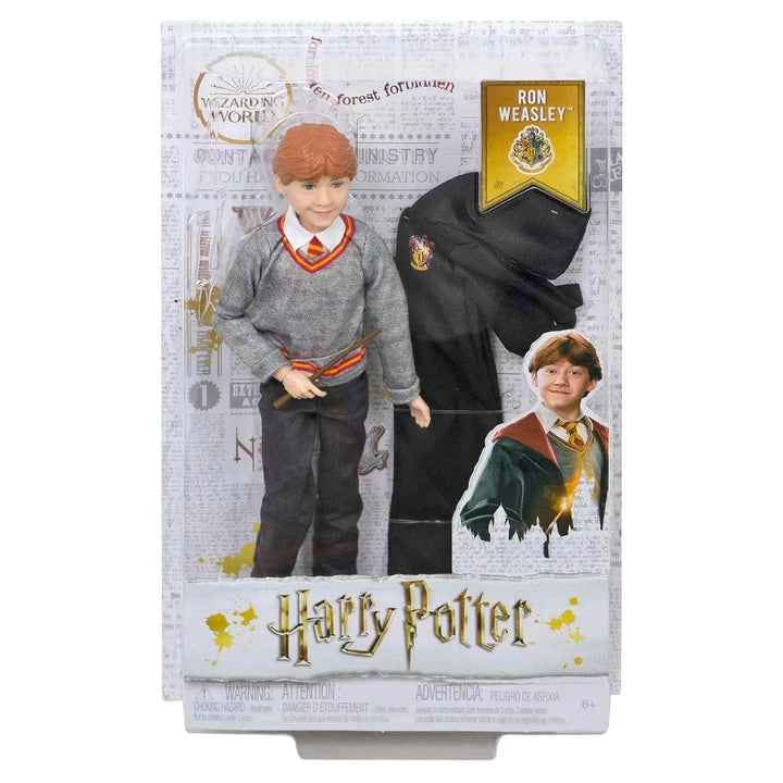 Ron Weasley collectible figure with Hogwarts uniform, house robe and wizard wand in display packaging