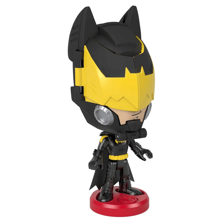 black and yellow batman figure on display stand