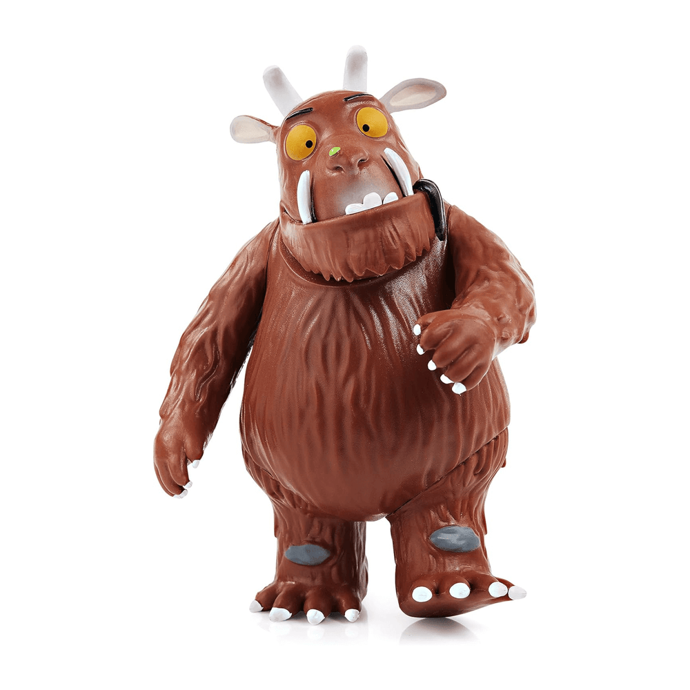 the gruffalo figure on white background with one leg in front of the other 