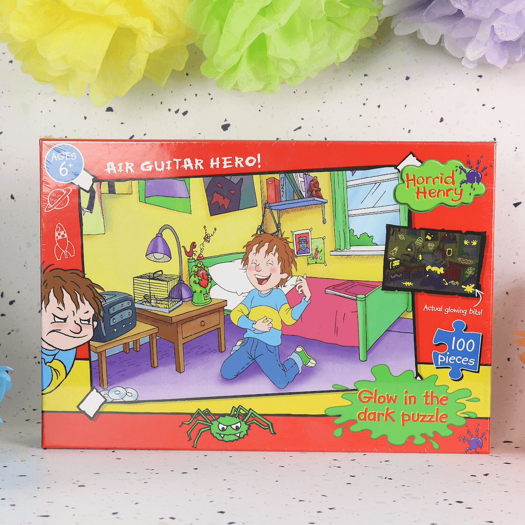 horrid henry air guitar hero box on colourful background with fun decorations