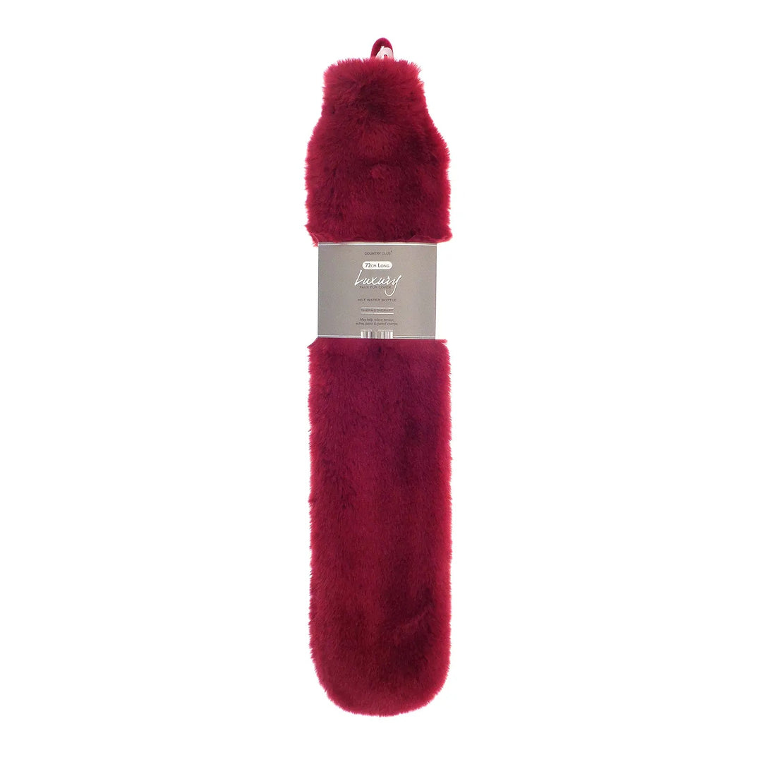 Long hot water bottle with pink faux fur cover and hanging loop