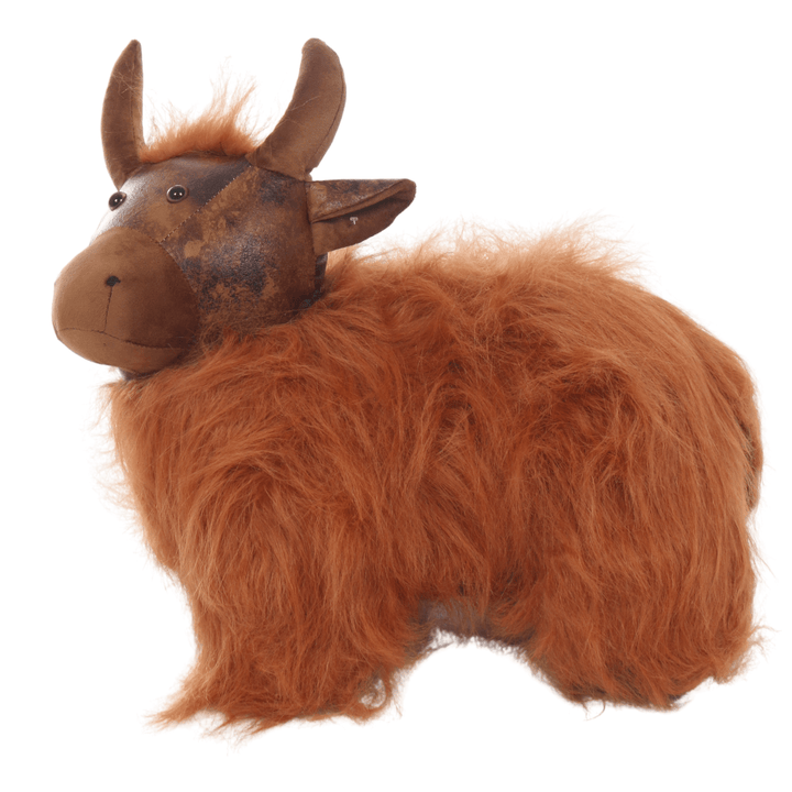 side view of adorable highland cow door stopper with plush realistic hairs