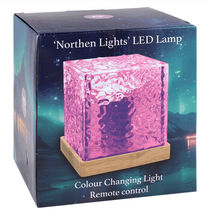 northern lights LED lamp in cube packaging with image of lamp and nothern lights background