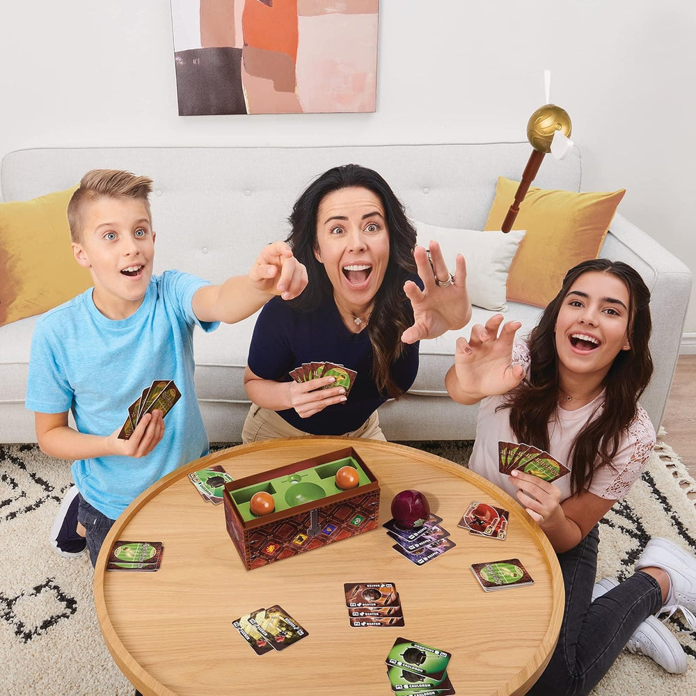 Family playing Catch the Golden Snitch game from the Harry Potter films