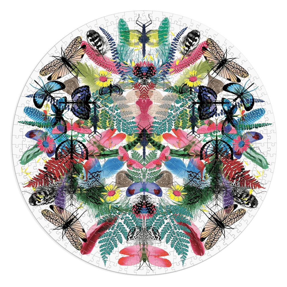 christian lacroix round puzzle completed on white background