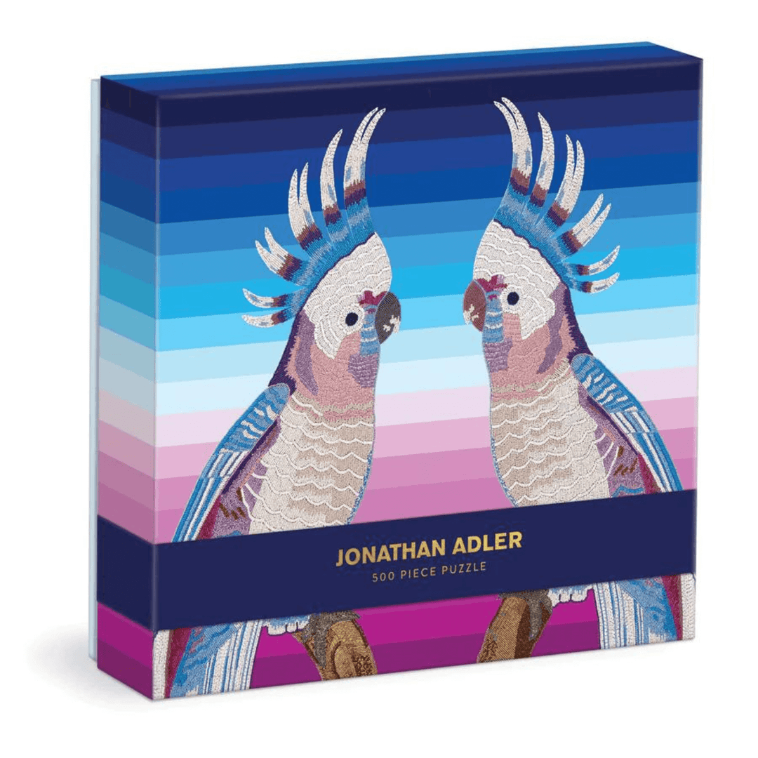 jonathan adler parrot design jigsaw with paper band over front of box