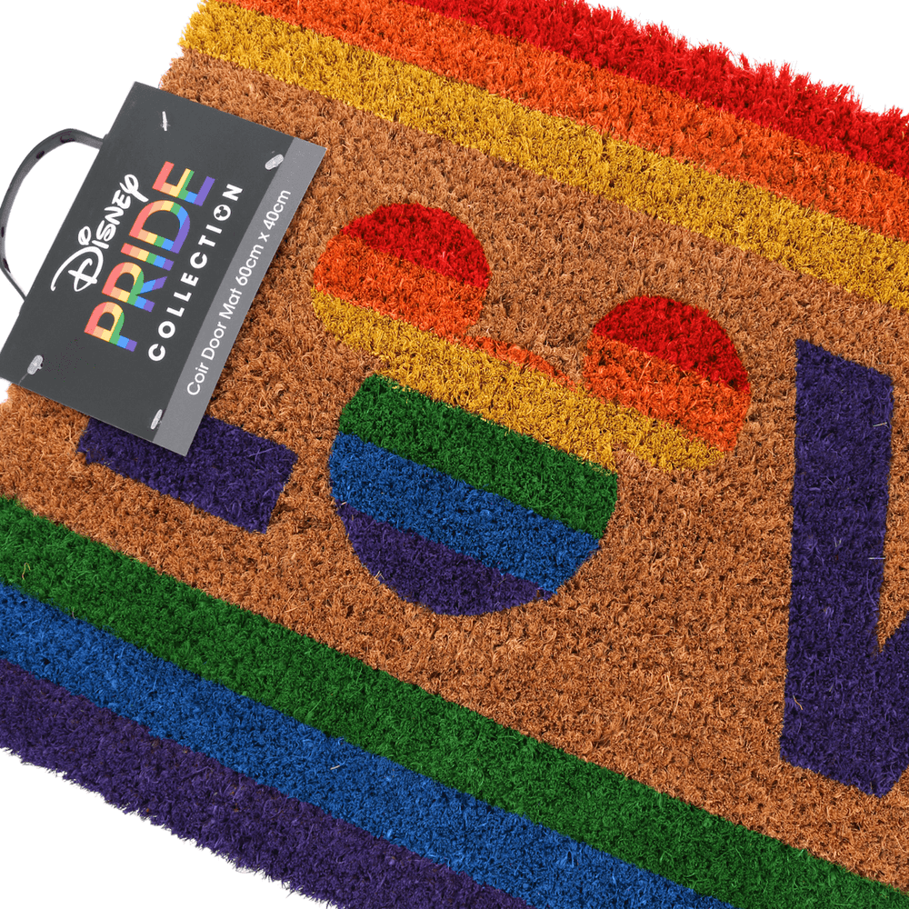 detail shot of mickey moouse head with rainbow colours on coir door mat