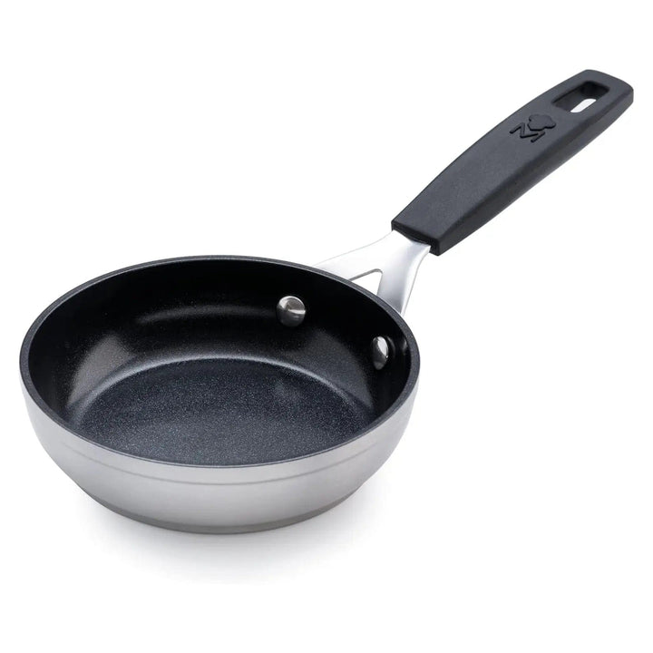 Small black and silver frying pan for individual portions