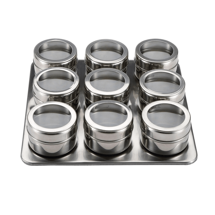 silver stainless steel spice jars on magnetic chrome silver tray