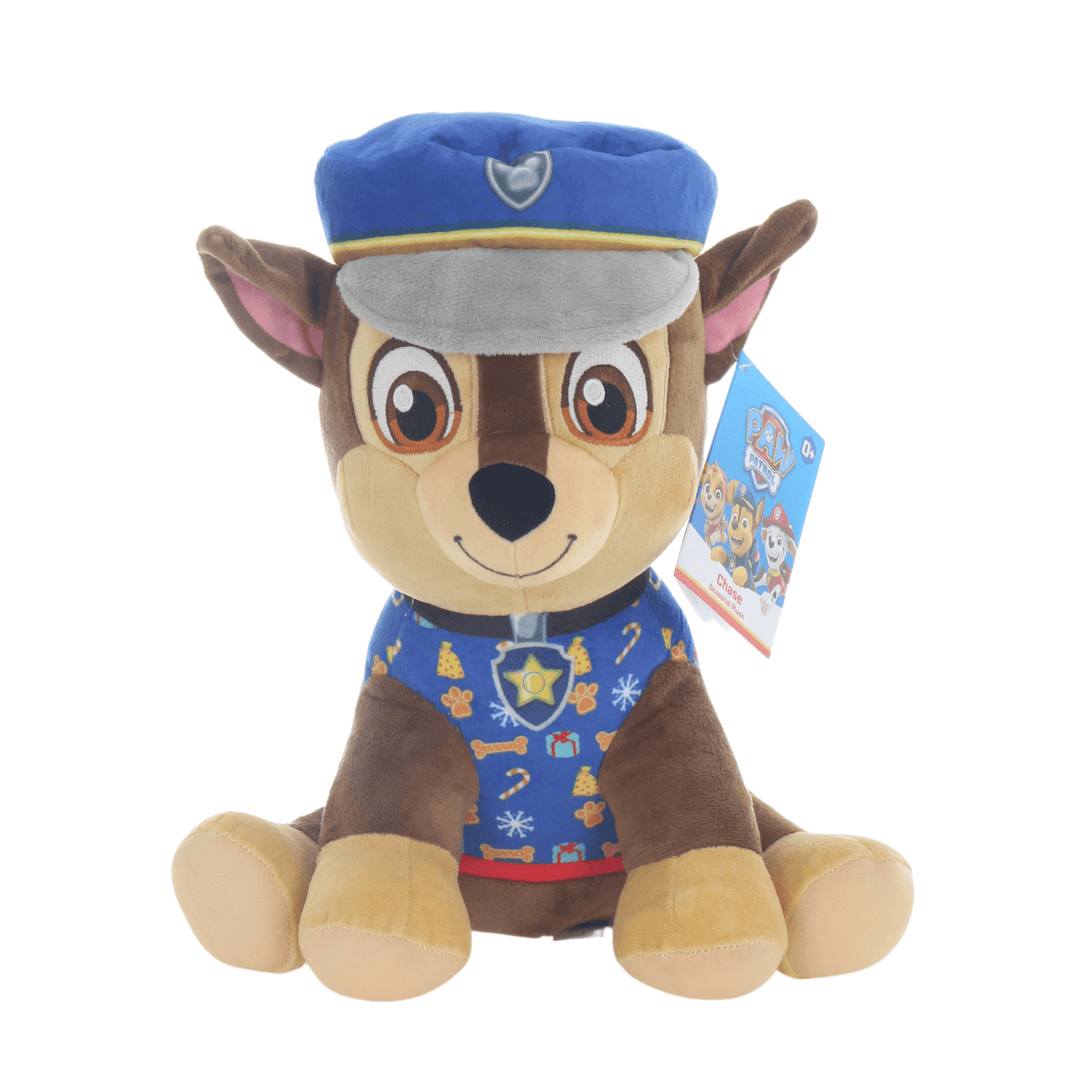 chase paw patrol dog wearing blue christmas jumper and paw printed police hat