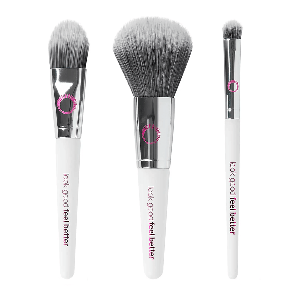 3 individual face brushes with white handle and pink embossed brand name