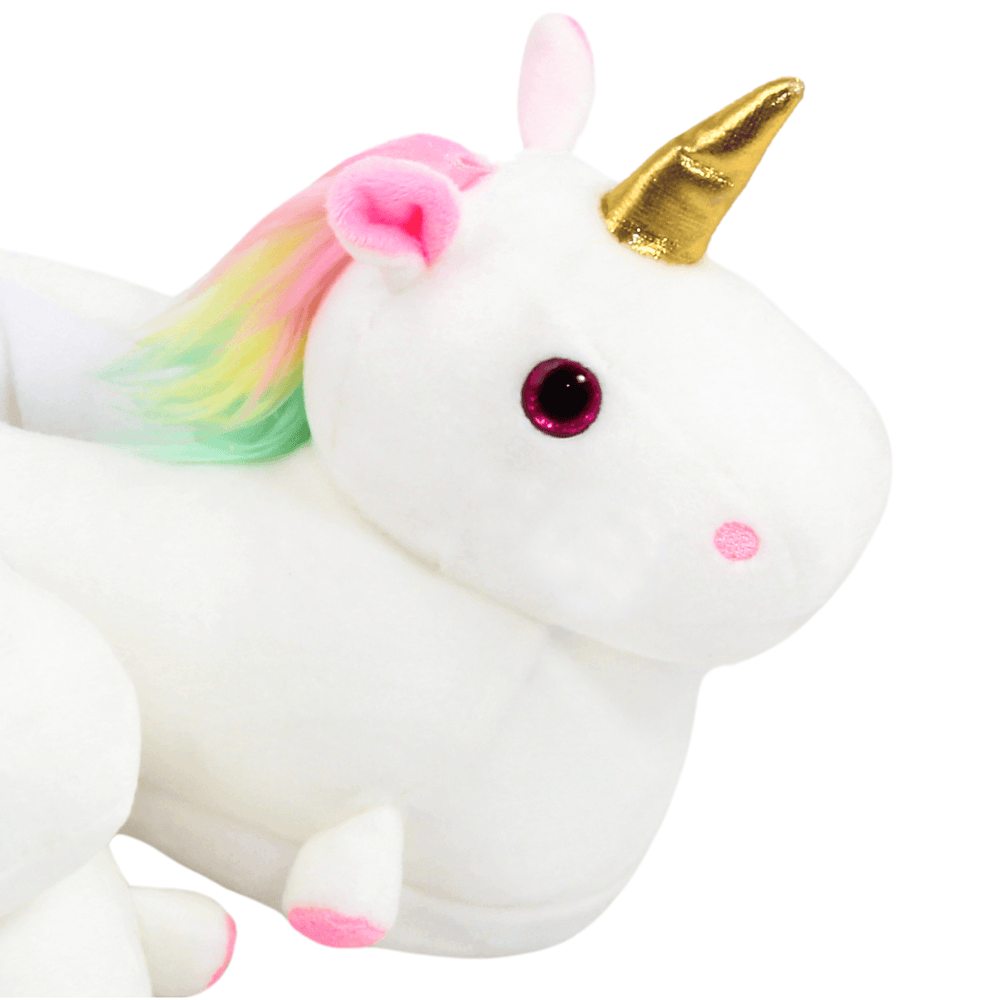 detail shot of unicorn eyes with pink glitter detail and gold 3d horn detail