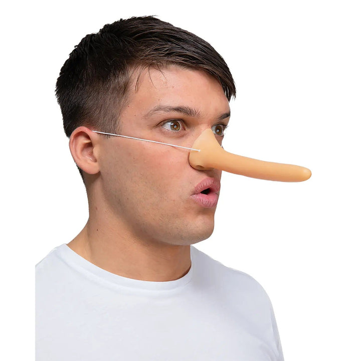 Man wearing a fake long nose for fancy dress costumes