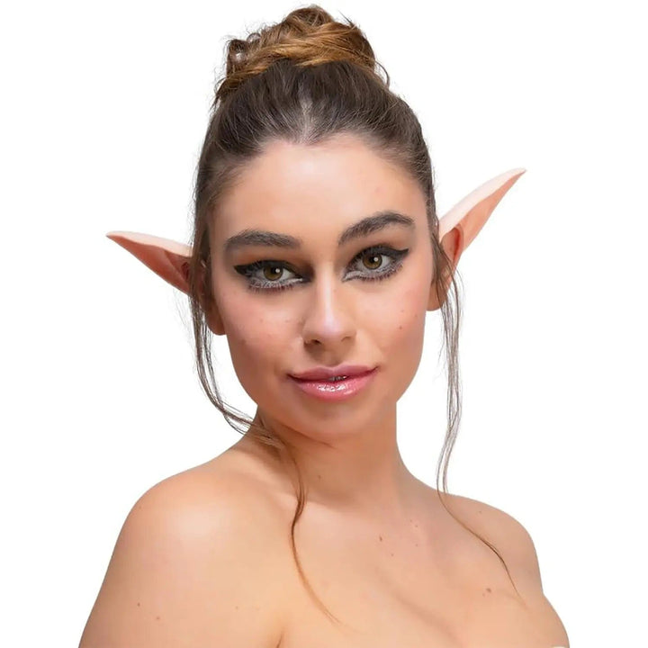 Lady wearing a pair of pointy ears for goblin, vulcan and elf fancy dress costumes