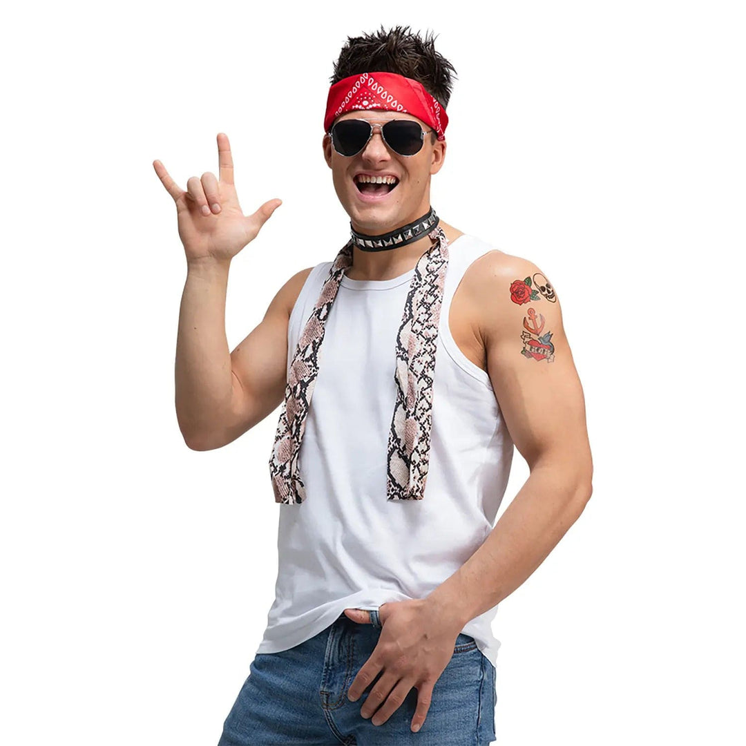 Man wearing a red bandana, sunglasses, choker, scarf and tattoos for 80s rock fancy dress costume