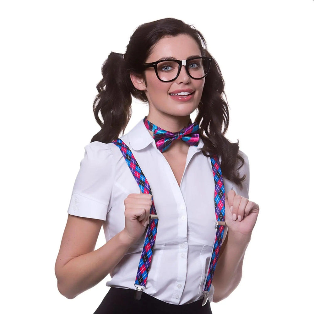 Lady wearing black rimmed glasses, white shirt with ink and purple check bow tie and matching braces