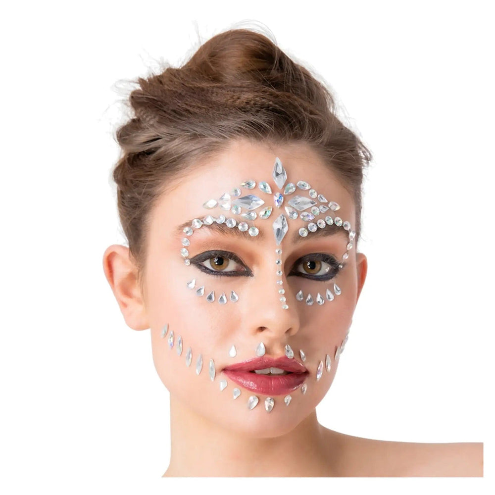 Model wearing a set of sugar skull inspired face gems for Halloween parties and festivals