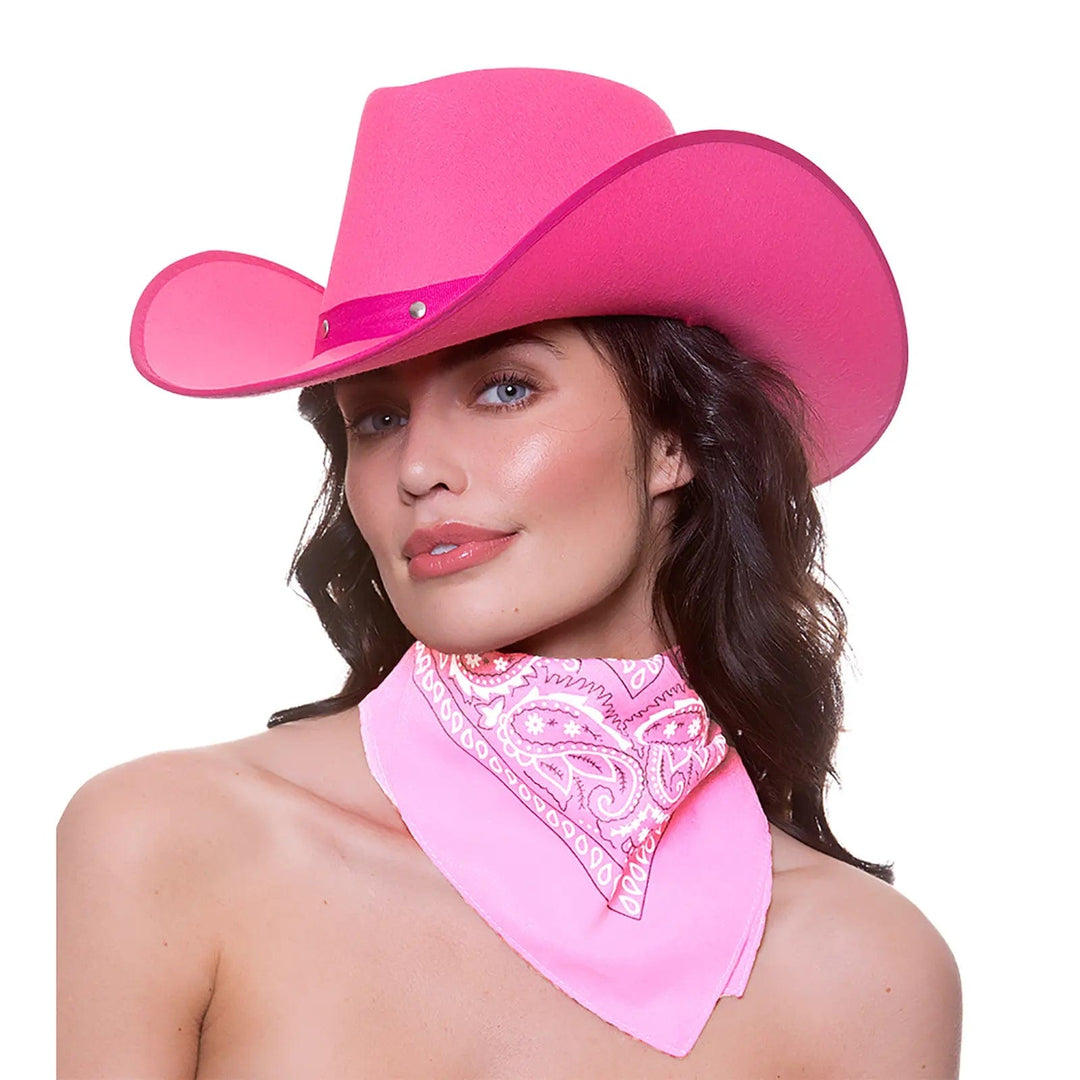 Lady wearing a bright pink cowby hat with a baby pink and white neckerchief bandana