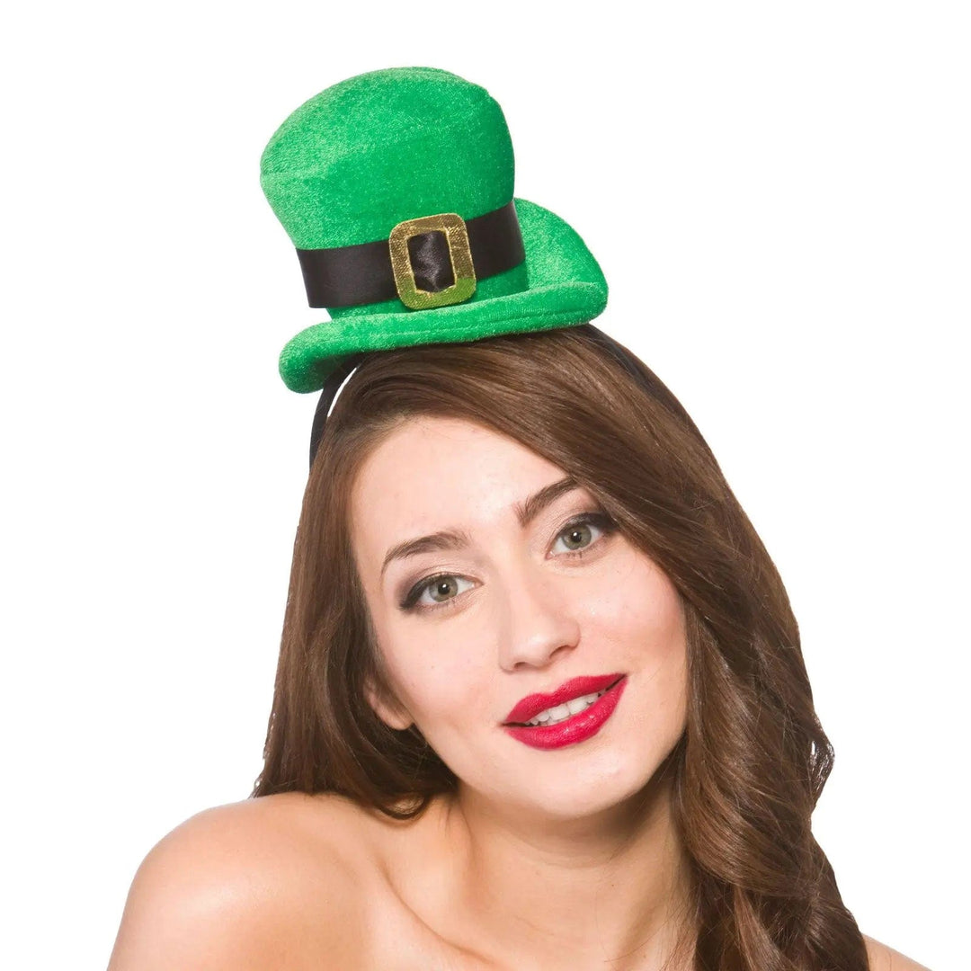 lady wearing a bright green St Patrick's Day hat with black band and gold buckle details