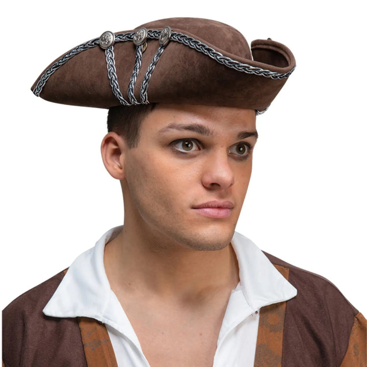 Man wearing a brown suede pirate hat with silver trim