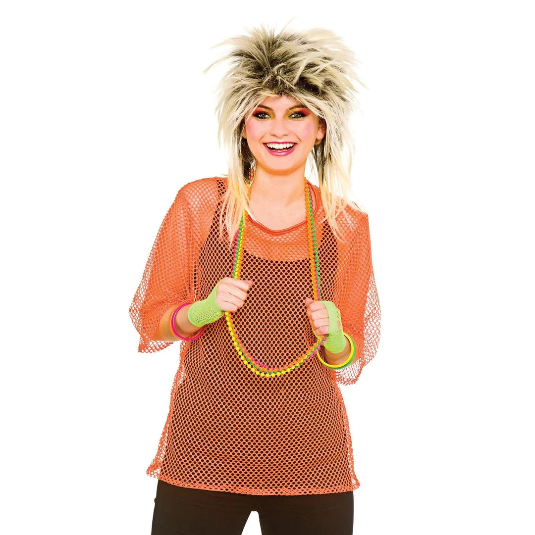 Young lady wearing a neon orange mesh top with 1980s punk style wig for fancy dress parties