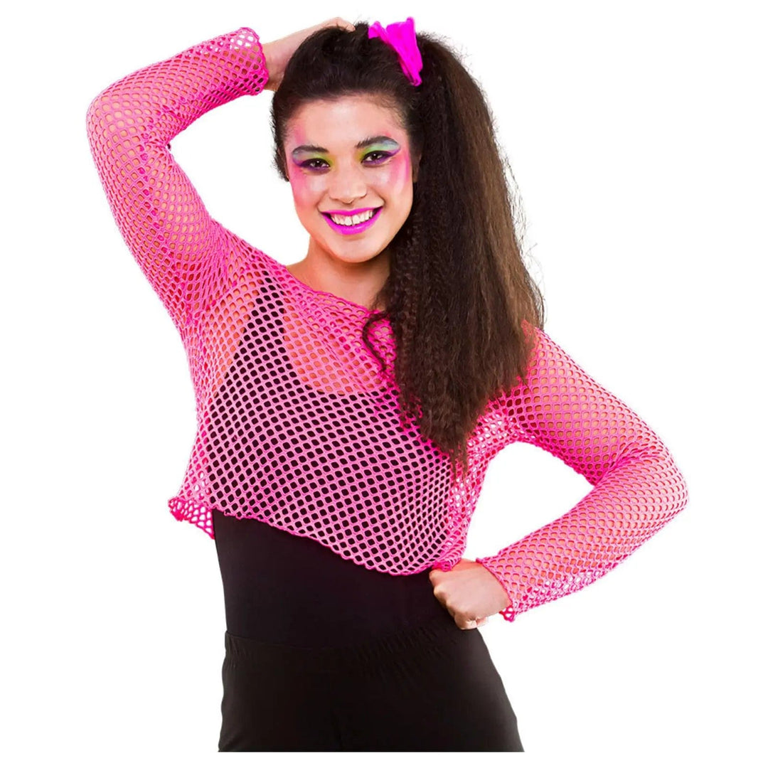 Young woman wearing a neon pink mesh cropped top with long sleeves for 80s fancy dress costumes