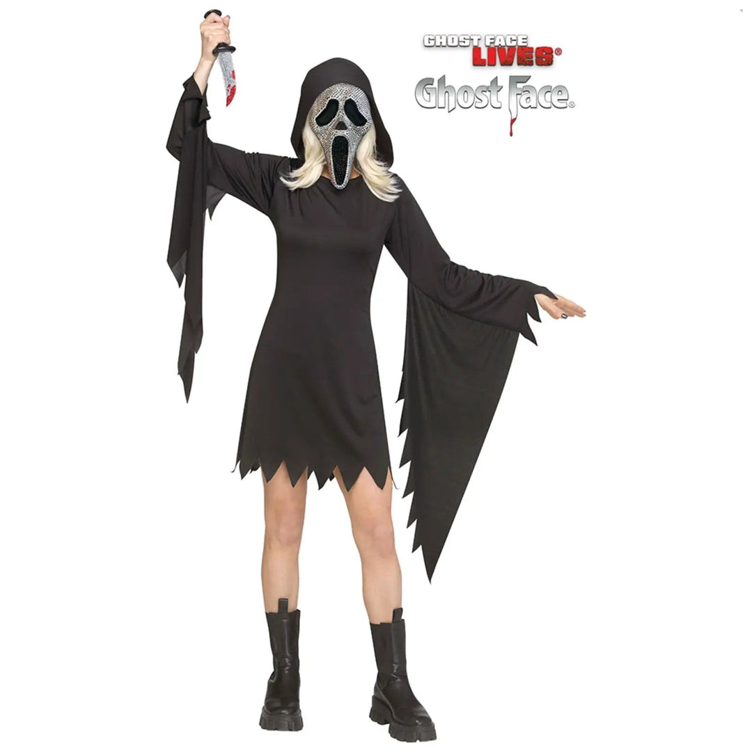 Woman wearing a diamante Ghost Face mask and a black hooded dress with jagged edge hem and sleeves