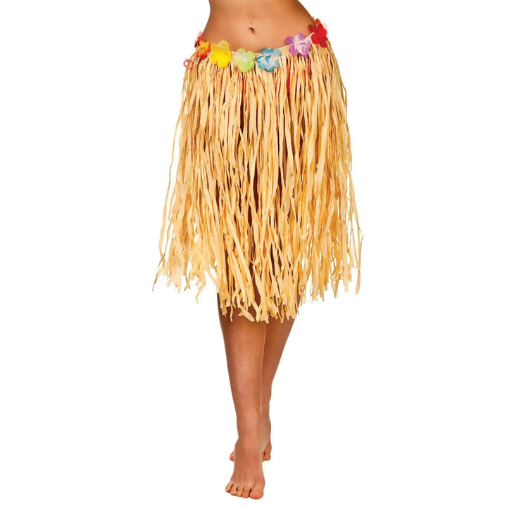 Woman wearing a Hawaiian hula skirt in a natural colour with flower waist band