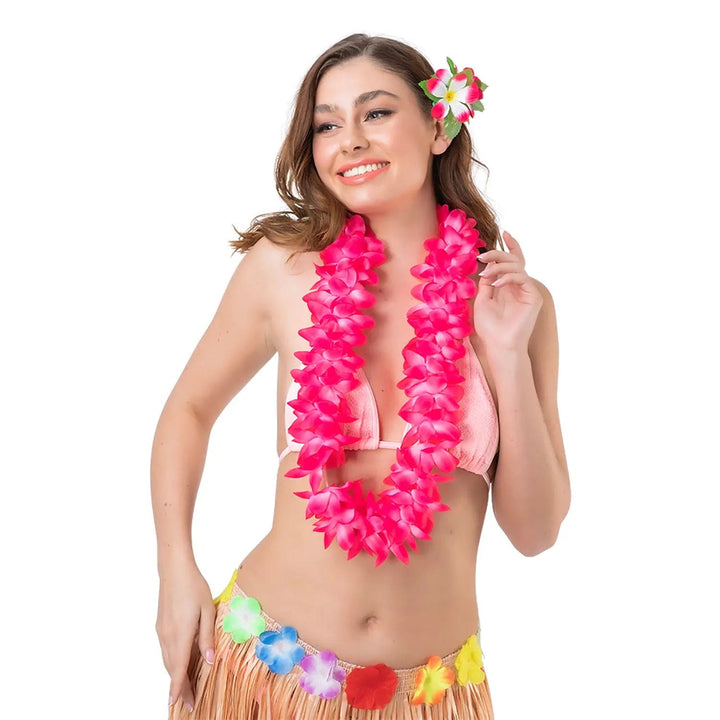 Woman wearing a bright pink orchid lei, flower necklace for Hawaiian beach parties and fancy dress