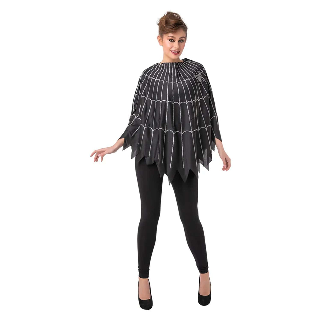 Female model wearing a black poncho with silver spder and web detail for Halloween costumes