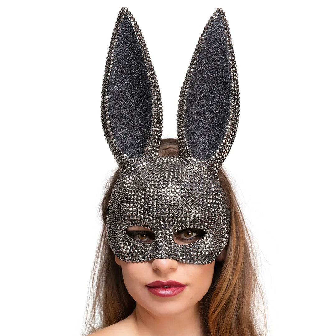 Woman wearing a sparkling rhinestone bunny ears mask for fancy dress parties