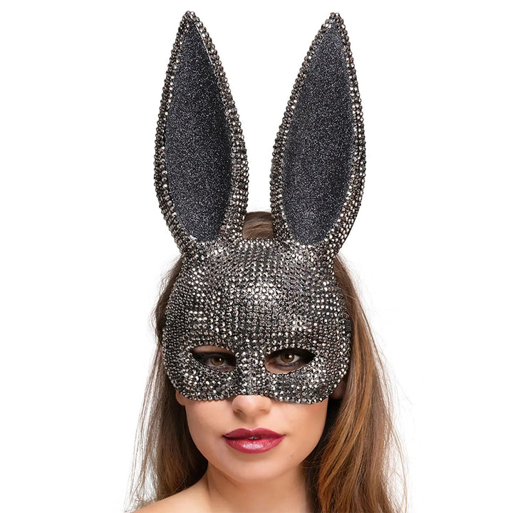 Woman wearing a sparkling rhinestone bunny ears mask for fancy dress parties