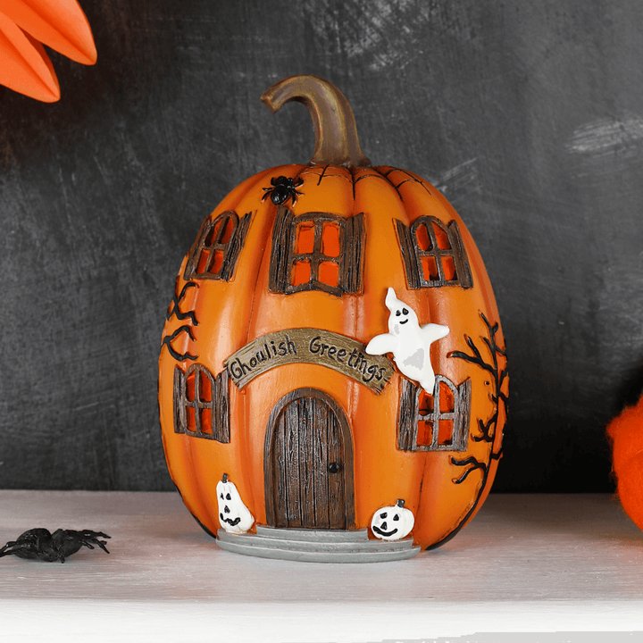 small LED pumpkin decoration with ED windows and mini ghost decorations