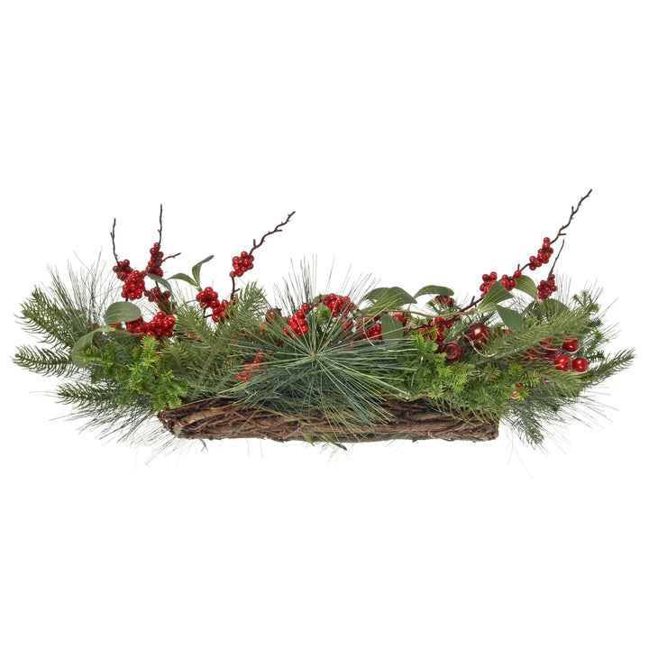 Side profile of a Christmas wreath with brown rattan base, green pine branches and red berries