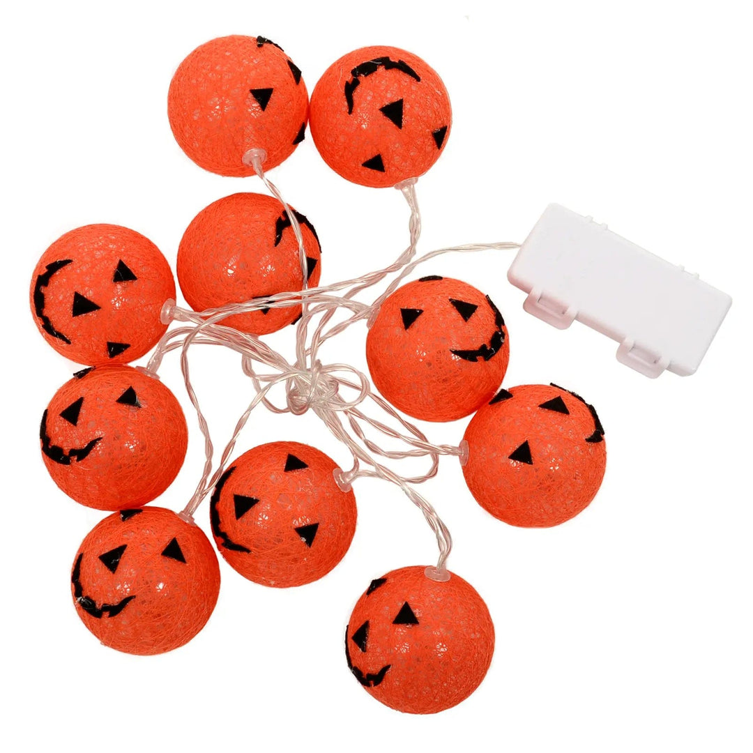 Set of 10 orange Halloween pumpkin lights with battery pack and clear wire