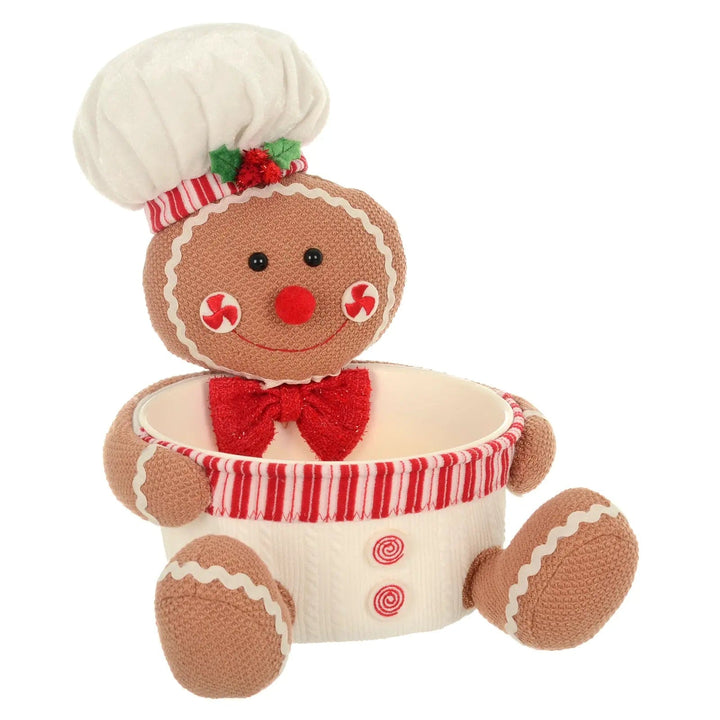 Christmas candy holder with gingerbread man figure holding the bowl