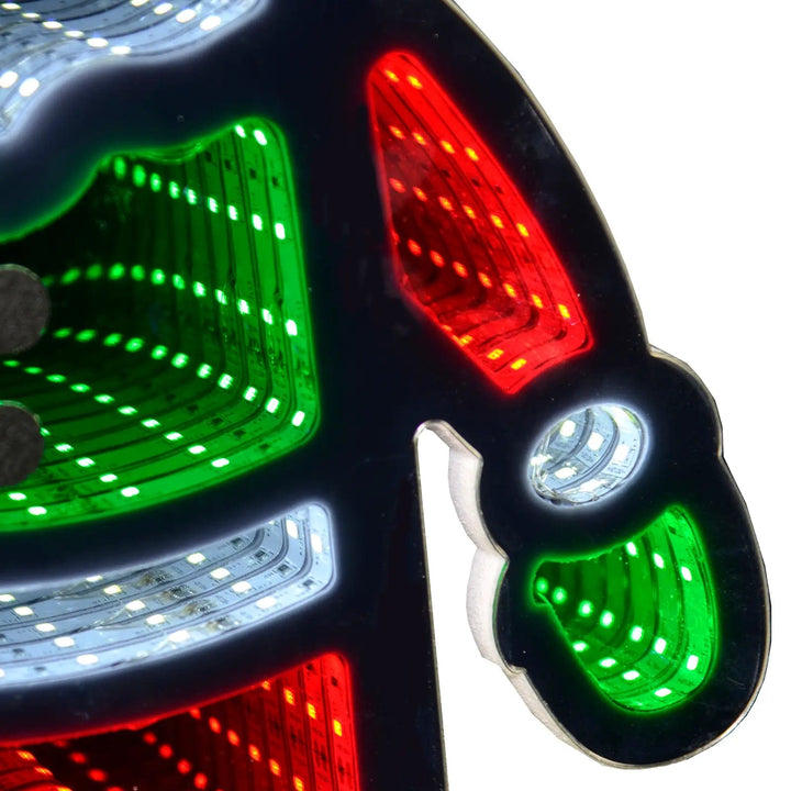 Close up of Red, green and white LED lights on an infinity mirror Christmas decoration