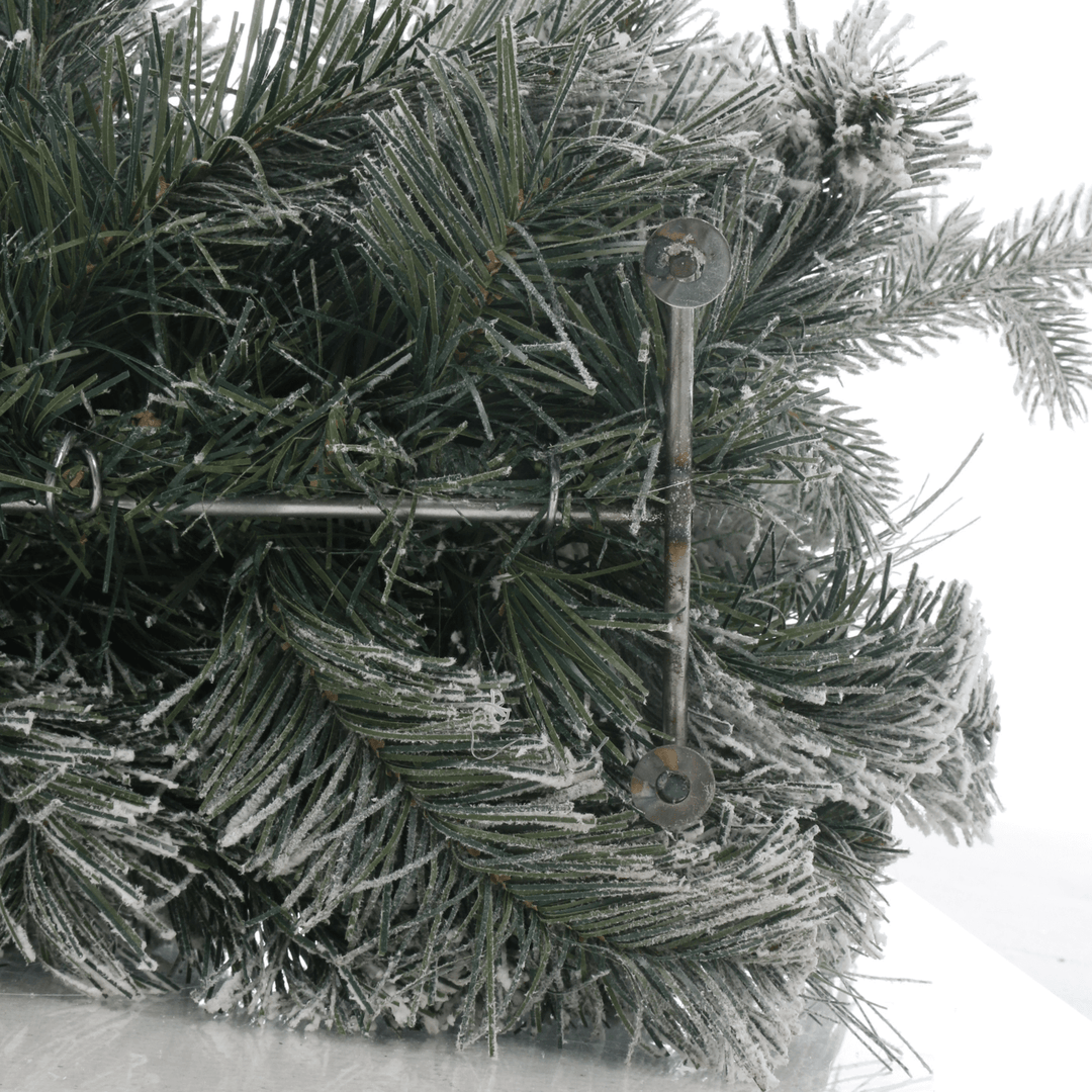 metal stand at the base of the centrepiece