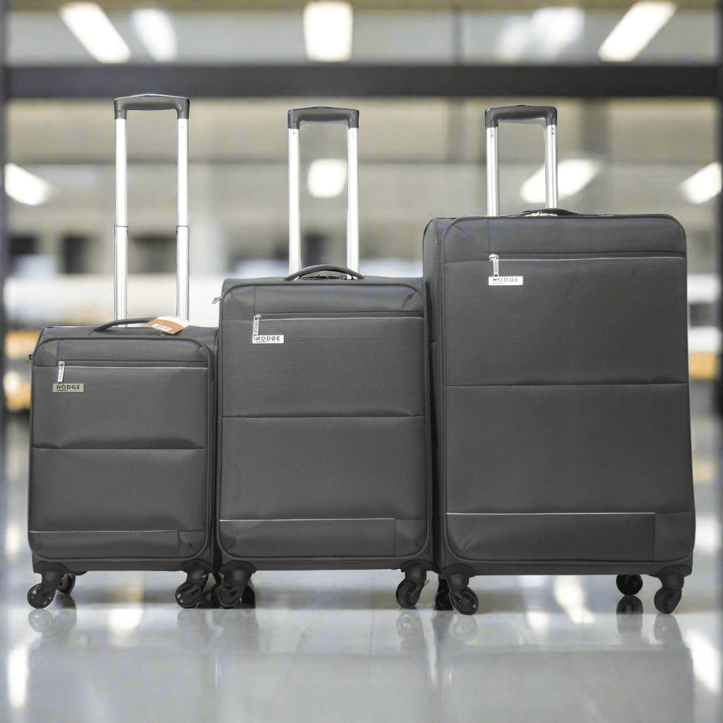 Grey H&H Luggage In airport departure area