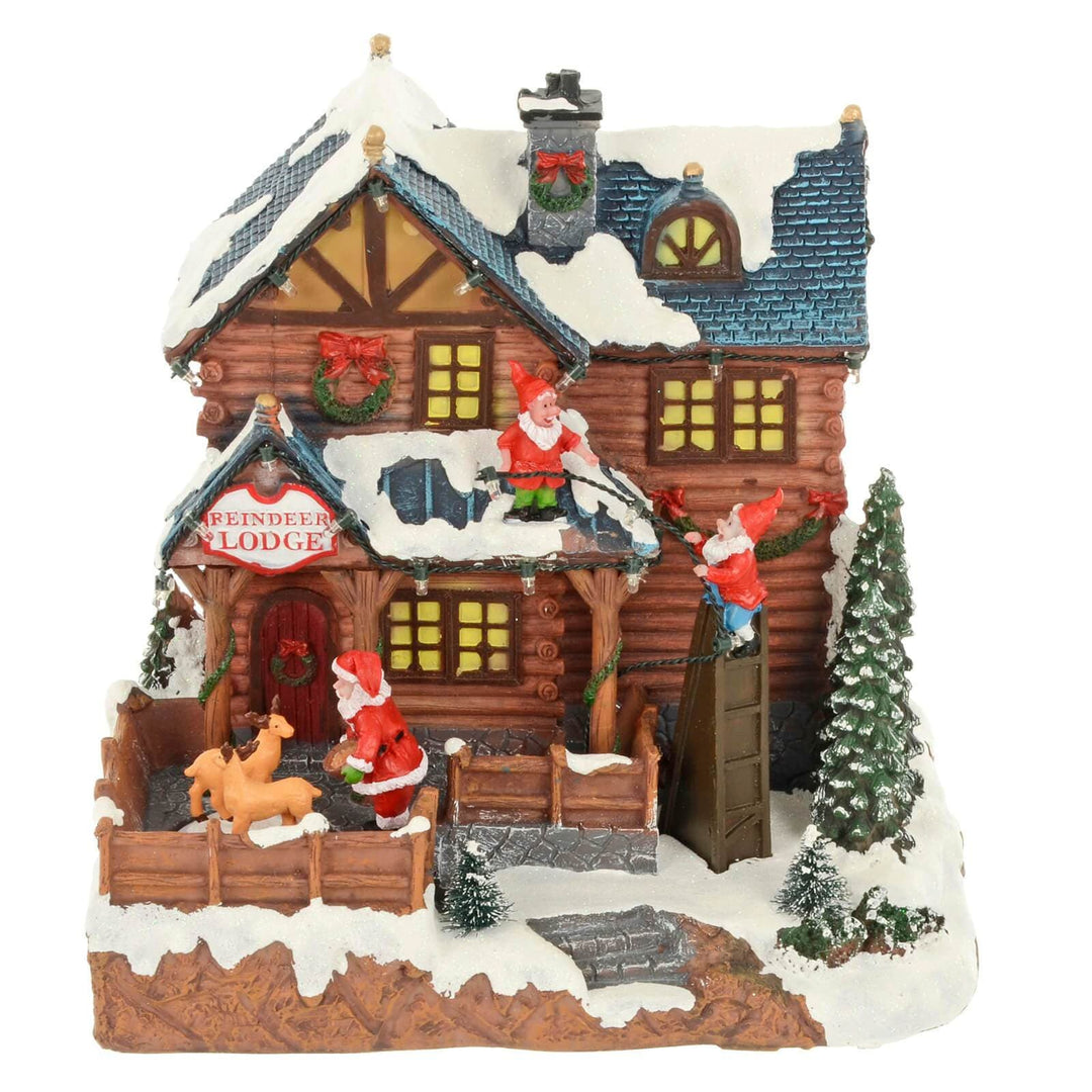 Christmas Reindeer Lodge Snow Scene Light Up Music Moving 24cm